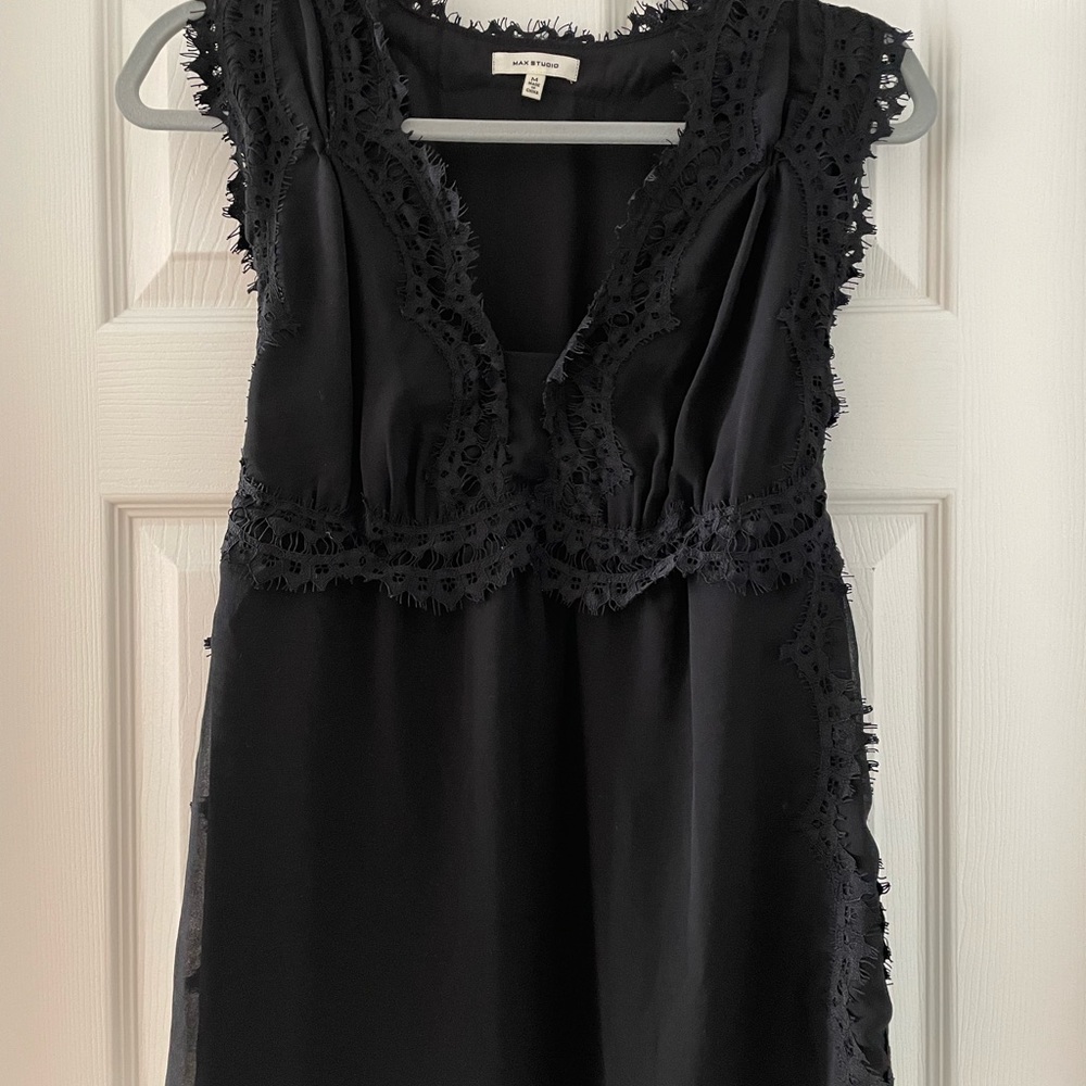 Max Studio adorable black sleeveless top sheer with lining.
